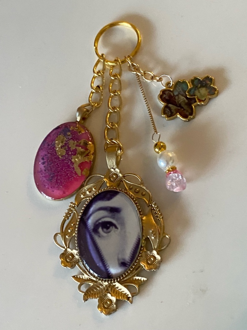 BAG CHARM KEYCHAIN PURSE ACCESSORIE FORNASETTI EVIL EYE PINK PURPLE FLORAL GOLD - Picture 3 of 6